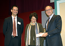 Loyd Grossman present the winning prize to Brian Lavoie and Rebecca Guenther, representing the PREMIS team